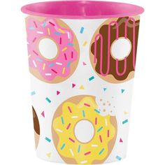 a paper cup with donuts and sprinkles on the outside, one is pink