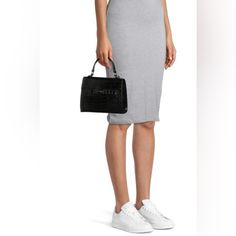 New With Tags. No Stains Or Flaws Madden Nyc Women's Boxy Top Handle Bag Black Time To Downsize. Madden Nyc’s Boxy Top Handle Bag Is Here To Carry You Through All This Season’s Occasions. The Mini Silhouette Is Right On Trend While The Turn-Lock Closure At The Front Keeps Your Necessities Safe. A Fun Pop Of Color To Add To Any Outfit, You’ll Never Put This Bag Down! Material: Manmade Materials Care: Spot Clean Country Of Origin: Imported Dimensions: 2.25” W X 4.75” H X 5” D; Width Is Measured Ac Chic Box Bag For Evening, Top Handle Box Bag For Evening, Crossbody Box Bag For Work, Chic Black Square Satchel, Chic Black Box Bag With Top Handle, Chic Black Box Bag With Detachable Handle, Chic Black Top Handle Box Bag, Chic Square Box Bag For Work, Black Satchel Box Bag For Work