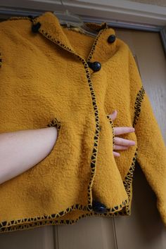 "Vintage 1970s jacket. No size labeled estimated size Medium - please see measurements. No pockets. MEASUREMENTS TAKEN ACROSS FRONT LYING FLAT Shoulder: 21\" Sleeve: 19\" Bust: 20\" armpit to armpit Length: 26\" Condition: Good - No flaws to note!" Retro Long Sleeve Hooded Jacket For Fall, Retro Long Sleeve Hooded Jacket For Winter, Yellow Long Sleeve Hooded Jacket With Pockets, Hooded Mustard Outerwear For Fall, Mustard Hooded Outerwear For Fall, Retro Long Sleeve Hooded Jacket With Pockets, Retro Hooded Jacket With Pockets And Long Sleeves, Retro Hooded Jacket With Pockets For Fall, Mustard Hooded Winter Outerwear