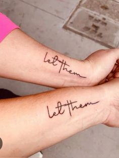 two people with matching tattoos on their arms that say, let them go to heaven