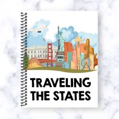 a spiral notebook with the words traveling the states on it and an image of the statue of liberty