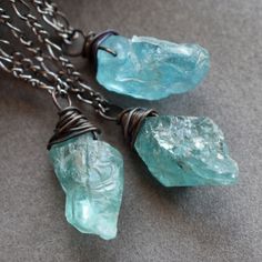 Mini Raw Apatite Necklace: Carry a piece of the earth's beauty with you wherever you go with this dainty raw gemstone necklace! Simultaneously modern and earthy, this versatile beauty will look amazing with anything in your closet! ✧ Hand selected natural raw apatite ✧ Crystal size 16-20mm long (.6-.8 inch), not including wire wrap ✧ Each crystal chosen with care and handled with loving intention ✧ Blackened copper wire wrap detail ✧ Gunmetal chain in your chosen length ✧ Hypoallergenic options Spiritual Aquamarine Gemstone Necklace, Handmade Spiritual Aquamarine Necklace, Spiritual Aquamarine Necklace For Gift, Turquoise Aquamarine Spiritual Necklace, Apatite Gemstone Pendant Necklace, Apatite Pendant Necklace With Natural Stones, Turquoise Mineral Crystal Necklace Gift, Turquoise Aquamarine Healing Necklace, Handmade Apatite Pendant Necklace