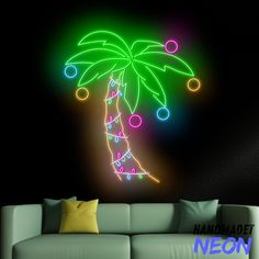 a living room with a couch and a neon palm tree