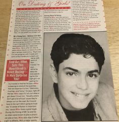 a newspaper article with a photo of a young man