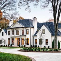 a large white house with lots of windows