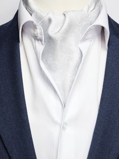 Men’s cravats – double pointed plain ascot in 100% silk.
Things are often today more casual, and an ascot tie is a great way to not look sloppy but elegant. In terms of patterns and strong colors, you can go bold because it’s a more casual accessory and of course, you always want to try to match the ascot with your outfit. So, an ascot should match the rest of your outfit in terms of its color and style, but it does not need to be the exact same color as the rest of the ensemble. If you wear a s Classic White Neckwear For Black Tie, Classic White Neckwear For Black Tie Events, Elegant White Handkerchiefs For Business, Elegant White Tie With Pocket Square, Classic White Neckwear For Business, Classic Silk Neckwear For Semi-formal Occasions, Elegant Semi-formal Neckwear With Inside Ties, Elegant Neckwear With Inside Ties For Semi-formal Occasions, Silk Neckwear With Pocket Square For Formal Occasions