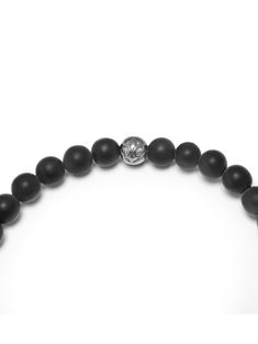 6mm Matte Onyx Beads Black CZ Diamond Bead Handmade in Los Angeles Product Code: MCHCO_084 This bracelet is strung on an elastic strand that easily slips on your wrist. The elastic strand is stretchy and will stretch like a rubber band when slipped on and off. Our durable elastic cord is covered in strong silicone and will permanently keep its soft elasticity. Designer's Notes Strung by hand from Matte Onyx beads and punctuated with our Black and White CZ Diamond Bead, you can't go wrong with th Change Bad Habits, Notes Craft, Onyx Bead, Rubber Band, Cz Diamond, Rubber Bands, Cz Stone, Onyx, Slip On