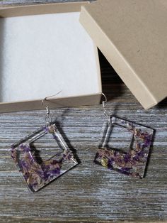 Beautiful and natural, geometric inspired earrings with large resin squared diamonds. Real flower earrings preserved in resin squares, with tiger lily flower and purple bell flower. Gorgeous natural flower petal earrings, boldly colorful, and preserved for eternal beauty ♥ Be sure to check out the PURPLE EARRINGS section at EarringsbyLCreations for all beautiful purple colored earrings available! https://www.etsy.com/shop/EarringsByLCreations?section_id=28420997 Made with quality materials and a Modern Square Pendant Earrings For Gift, Modern Square Pendant Earrings As Gift, Square Hypoallergenic Earrings For Gift, Hypoallergenic Square Earrings For Gifting, Hypoallergenic Square Earrings As Gift, Hypoallergenic Square Earrings For Gifts, Flower Petal Earrings, Real Flower Earrings, Petal Earrings