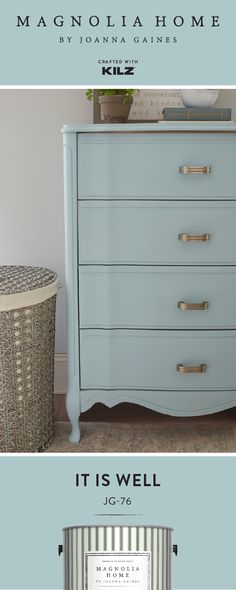 an old dresser has been painted blue and white with gold hardware on the bottom, it's well cleaned