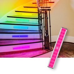 an image of a stair case with neon lights on it