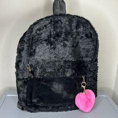 Brand New, Never Used Faux Fur Backpack Comes With Removal Black Faux Fur Heart Puff Two Side Drink Slots Gold Zipper Closure Adjustable Straps Front Pouch Opening Spacious Inside W/ Rose Print Pattern Inside Slot Pocket Size Approx. 31cm*11cm*40cm (About The Avg School Size Backpack) Imported We Are A Relatively Low Priced Fashion Bags Boutique, Please Be Reasonable On Offers! Tags: Rhinestone Purse , Prom Clutch , Spring Purse , Summer Purse , Winter Purse , Denim Purse , Transparent Purse , J Rose Print Pattern, Winter Purse, Transparent Purse, Winter Purses, Fur Backpack, Insulated Backpack, Spring Purses, Rhinestone Purse, Prom Clutch