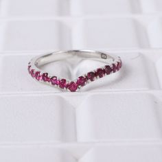 Pink Ruby Chevron Wedding Band, Solitaire Matching Band, Women's July Birthstone Delicate Band, 925 Sterling Silver Tiara Stacking Band Maine Stone - Ruby Stone Creation - Lab Created Stone Shape - Round Stone Color - Pink Stone Size - 2 MM Birthstone - July Features: * Handmade * Ready To Ship * Brand New * All Ring Sizes Available * Suitable For Every Day * 14k Solid Gold / 18k Solid Gold / Gold Filled Over Sterling Silver * Purity Stamped * Fits True to Size * High Quality * Available Color: Silver Ruby Wedding Jewelry, Chevron Wedding Band, Chevron Wedding, Silver Tiara, Pink Ruby, Stacking Bands, Ruby Stone, July Birthstone, Ring Sizes