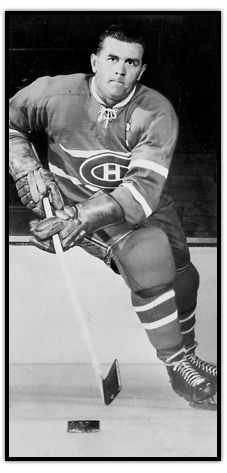 an old black and white photo of a hockey player