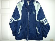 Vintage 90s Adidas Puffy Coat.Zippers on sleeves really cool feature.The name Adidas exposed when unzipped on sleeves.Missing small pull tab on front zipper.X Large Adidas 2000, Adidas Coat, Green Adidas, 90s Adidas, Puffy Coat, Swaggy Outfits, Vintage Clothing, Nike Jacket, Etsy Listing