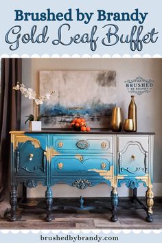 a blue and gold painted dresser in a living room