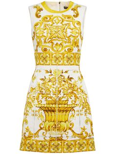 Zip closure. All over print placement may vary. Model is wearing a size40 Majolica Print, Elegant Mini Dress, Printed Short Dresses, Cotton Mini Dress, Brocade Dresses, Yellow Silk, Dress Crafts, Silk Mini Dress, Dolce E Gabbana