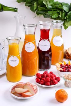 there are many different types of juices on the table