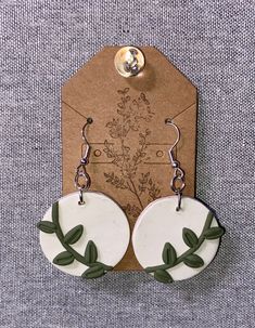 Sage green vines with a white background dangle earrings. Botanical Green Drop Earrings, Green Botanical Drop Earrings, Nature-inspired White Drop Earrings, White Nature-inspired Drop Earrings, Handmade White Botanical Earrings, Handmade White Leaf-shaped Earrings, White Leaf-shaped Earrings With Ear Wire, Chandbalis Earrings, Long Turquoise Earrings