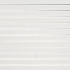 a white wall with vertical lines painted on it