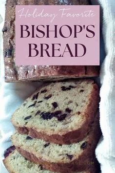 a loaf of bread sitting on top of a white cloth next to a pink sign that says, holiday favorite bishop's bread