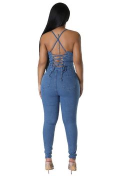 Slip into the Judy Denim Sexy Jumpsuit for a flirty and playful look. This sleeveless jumpsuit features a strip wrap neckline and back detail, a front button design, and skinny pants for a sleek and stylish fit. Model size small 5'8" 36-26-38 Bust 35 inches, Hips 37 inches, Waist 27 inches, Length 55 inches. Fabric Contents POLYESTER COTTON Button Corset, Stretch Jumpsuit, Night Out Tops, Pants Model, Denim Jumpsuit, Button Design, Cross Straps, Corset Top, Plus Size Tops