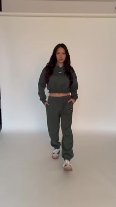 Elevate your athleisure style and feel like you're lounging on the go with our Hunter Green GH Jogger Sweatpants. The elastic waistband and tapered leg style allows you to feel secure and trendy. Complete with dual side pockets to keep your essentials close by. Pair with ur Hunter Green GH Cropped Hoodie to complete the set. Trendy Sweats With Elastic Waistband For Jogging, Casual Green Sweatpants With Elastic Side Panels, Trendy Sweats With Ribbed Waistband For Jogging, Parachute Pants With Cargo Pockets For Loungewear, Trendy Sweatpants With Ribbed Cuffs For Jogging, Trendy Jogging Sweatpants With Ribbed Cuffs, Trendy Sports Sweatpants With Elastic Waistband, Casual Tracksuit With Side Pockets For Sports, Trendy Cargo Pocket Sweatpants For Loungewear