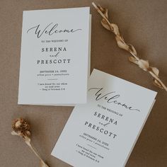 the wedding stationery is laid out next to each other