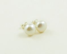 Everybody love a simple pair of pearl earrings because of their simple style, easy to pair with any outfit. These are white freshwater pearl half round set on sterling silver post earrings. Great 2 sizes to choose : 4mm and 8mm. Perfect as a gift for all ages and occasion. Item specification : ✦ Size / Color : 4mm and 8mm in White color ✦ Material : Freshwater pearl with sterling silver post ✦ Style : Stud earrings ✦ Arrived in presented gift box Note to my lovely international customers : - All Classic Pearl White Pearl Earrings For Gift, Handmade Classic Pearl Earrings For Everyday, Classic Pearl Earrings As Bridesmaid Gift, Classic Earrings For Bridesmaid Gift, Classic White Pearl Earrings For Bridesmaid Gift, Pearl Studs Earrings, Everyday Earrings Studs, Earrings Classic, Earrings Everyday