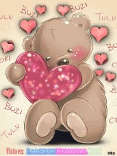 a brown teddy bear holding a pink heart