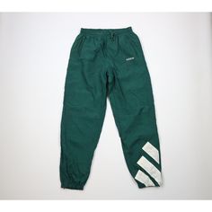 Vtg 90s Adidas Mens Medium Spell Out Big Logo Lined Nylon Joggers Pants Green Mens Pants Blemishes front right, waistband, back left. Inner bottom lining is ripped and has blemishes Mens size Medium Measurements are: 14 inches across the waist laid flat 32 inch inseam 43 inches from top to bottom Green Nylon US Shipping is FREE Canada is $15 and International is $24 Check out my other items in my store! PR1491 Green Nylon Sports Pants, Green Nylon Sport Pants, Green Full-length Parachute Pants For Streetwear, Green Parachute Pants For Streetwear, Green 90s Style Streetwear Bottoms, 90s Style Green Pants With Pockets, 90s Green Pants With Pockets, Retro Green Bottoms For Streetwear, Green Retro Bottoms For Streetwear