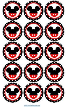 mickey mouse cupcake toppers with red and black polka dots on the bottom,