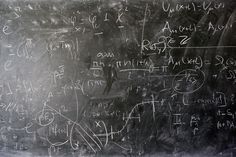 an old blackboard with some writing on it