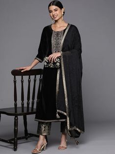 * Women Black Floral Motifs Embroidered Velvet Kurta with Trousers & Dupatta Pakistani Salwar Kameez / Indian Wedding Dress / Plus Size Velvet Dress / Cotton Kurta Set / Silk Kurta Set Traditional Indian Wear / Salwar Kameez Dupatta / Kurti Palazzo Set / Hand Embroidery kurta * Black embroidered Kurta with Trousers with dupatta * Kurta design:- * Ethnic motifs embroidered * A-line shape * Regular style * Round neck, three-quarter regular sleeves * zari detail * Calf length with straight hem * Ve Black Zari Work Dress For Celebrations, Black Semi-stitched Dress For Celebration, Black Dress With Resham Embroidery For Celebration, Elegant Black Kurta For Celebration, Festive Black Dupatta For Celebration, Black Dress With Dupatta For Celebration, Black Celebration Dress With Dupatta, Black Kurta With Zari Work For Celebration, Traditional Long Sleeve Party Wear With Embroidered Border