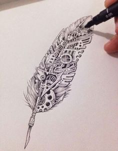 a drawing of a feather on paper with a marker in the foreground and an ink pen in the upper right hand corner