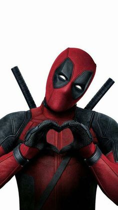 the deadpool character is holding two baseball bats