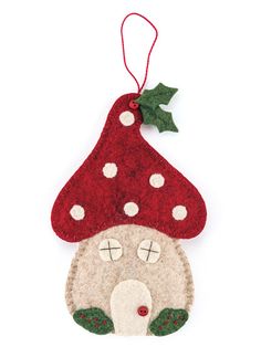 a felt ornament with a red hat on it