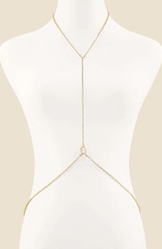 Brighten the heart of your ensembles with a golden body chain that places a cubic zirconia–detailed chain over your chest. Goldtone plate/cubic zirconia Imported Delicate Body Chain For Party, Dainty Body Chain For Party, Dainty Chain Body Jewelry For Wedding, Minimalist Clavicle Chain Body Chain As Gift, Minimalist Body Chain As A Gift, Minimalist Clavicle Body Chain As Gift, Minimalist Gold Body Jewelry For Party, Gold Dainty Body Jewelry For Party, Gold Clavicle Chain Body Chain For Wedding