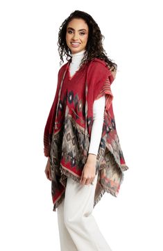 Elevate your festival look with this layer-ready poncho that features a drawstring hood and allover eye-catching pattern. Drawstring hood Short sleeves 73% acrylic, 12% viscose,9% wool, 6% lurex Dry clean Imported Hooded Red Poncho For Fall, Hooded Fall Festival Poncho, Red Hooded Poncho For Fall, Red Bohemian Hooded Poncho, Red Hooded Bohemian Poncho, Red Cape Poncho For Festival, Red Poncho For Festival In Fall, Red Fall Festival Poncho, Red Bohemian Poncho For Winter