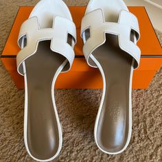 Highly Sought Out For The Summer Sandals Made In 2022. Bought From Luxurysnob Brand New! Comes In Box And Bust Bag. Sold Out Everywhere! Stunning And Gorgeous Shoes Won’t Be Up For Sale For Too Long Grab Yours While You Can! Worn Total Of 3 Times Otherwise Kept In Mint Condition! No Returns Final Sale No Lowballers Please Luxury White Heels For Beach, Designer White Slides For Summer, Elegant White Slides For Beach, Luxury White Beach Heels, Hermes White Sandals, Hermes Legend Sandals, Hermes Sandals Yellow, Hermes Extra Sandal, Hermes Shoes