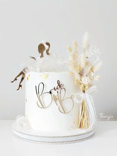 a wedding cake with the word love written on it