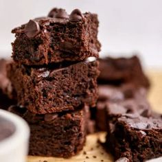 chocolate brownies stacked on top of each other