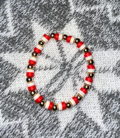 Red and white beads with gold balls  This is a size 7.5 inches bracelet can be made bigger or smaller. If you need a different size, please put a description of what size you need. Kids-6.5 Woman-7.5 Men-8.5 Beads With Gold Balls, Red And White Christmas, White Beads, White Christmas, Bracelet Sizes, Red And White, Jewelry Bracelets, Handmade Items, Beaded Bracelets