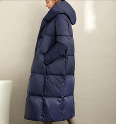 This down coat make with 90% duck down ,very warm in the winter .also could be custom made for any size. This is a winter down jacket fill with down.we design it with a very thick and warm style.this hooded down jacket could keep you very warm in the cold winter.the side pockets is very useful.a unique design women winter coat. Material: 90% duck down ,polyester Style: Casual Package Contents: 1 x down coat S:Length:110cm chest:106cm shoulder:39 cm sleeve:60cm M:Length:110cm chest:110cm shoulder