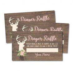 two wooden signs with deer heads on them, one is for diaper raffle and the other is for diaper raffle