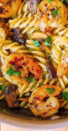 close-up of Pesto Shrimp Pasta Basil Pesto Shrimp, Shrimp Mushroom Pasta, Shrimp Mushrooms, Pasta Basil, Shrimp Mushroom, Basil Pesto Sauce, Spiral Pasta, Shrimp Recipes For Dinner