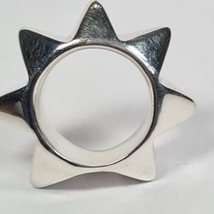 **Please note that we dispatch on Tuesdays unless special delivery express option is paid for** Sterling silver 'Big Star' ring. Original design carved in wax then lost wax cast into solid sterling silver. This was one of my first ever designs.  Very chunky ring which weighs approximately 38g in silver. Available in ring sizes T-X. Please message us if you're looking for other sizes and we will see what we can do.  First class recorded post included. Modern Silver Ring, Aqua Chalcedony Ring, Spike Ring, Art Nouveau Ring, Unusual Rings, Chunky Ring, Chalcedony Ring, Gothic Rings, Modern Ring