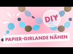 a pink background with some blue and brown leaves on it, and the words diy written