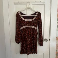 Multiple Colors In A Floral Pattern. 100% Cotton With Cotton Lining. Nwt! Measurements: Armpit To Armpit: 17” Shoulder To Cuff: 26” Top To Bottom: 32.5” Casual Brown Dress With Lace Trim, Casual Mini Dress With Lace Trim For Fall, Spring Brown Mini Dress From Urban Outfitters, Urban Outfitters Long Sleeve Fall Dresses, Casual Fall Dress From Urban Outfitters, Casual Fall Dresses By Urban Outfitters, Bohemian Floral Print Dress By Urban Outfitters, Urban Outfitters Casual Fall Dress, Casual Urban Outfitters Dress For Fall