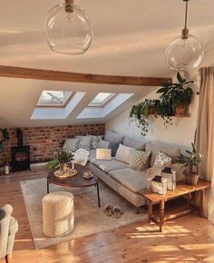 a living room filled with furniture and lots of windows