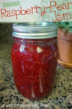 homemade raspberry - pear jam in a mason jar